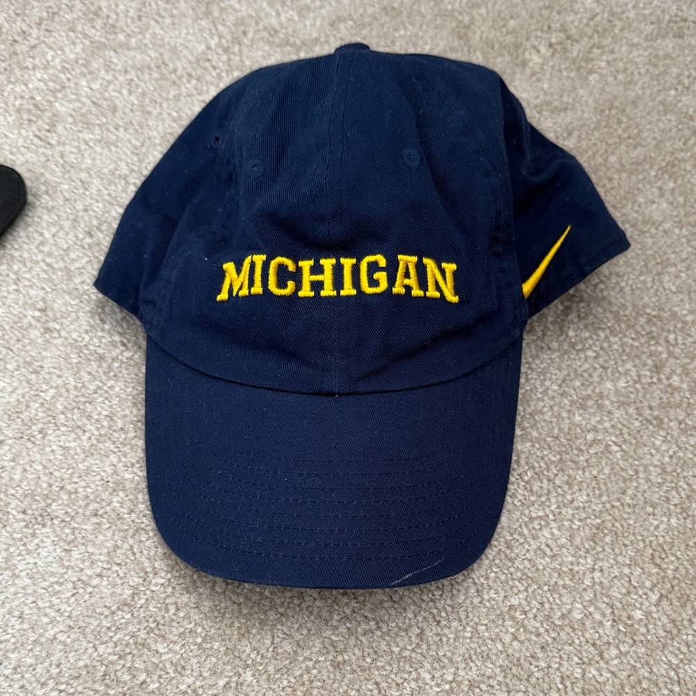 Nike Michigan Embroidered Navy Baseball Cap with Yellow Logo